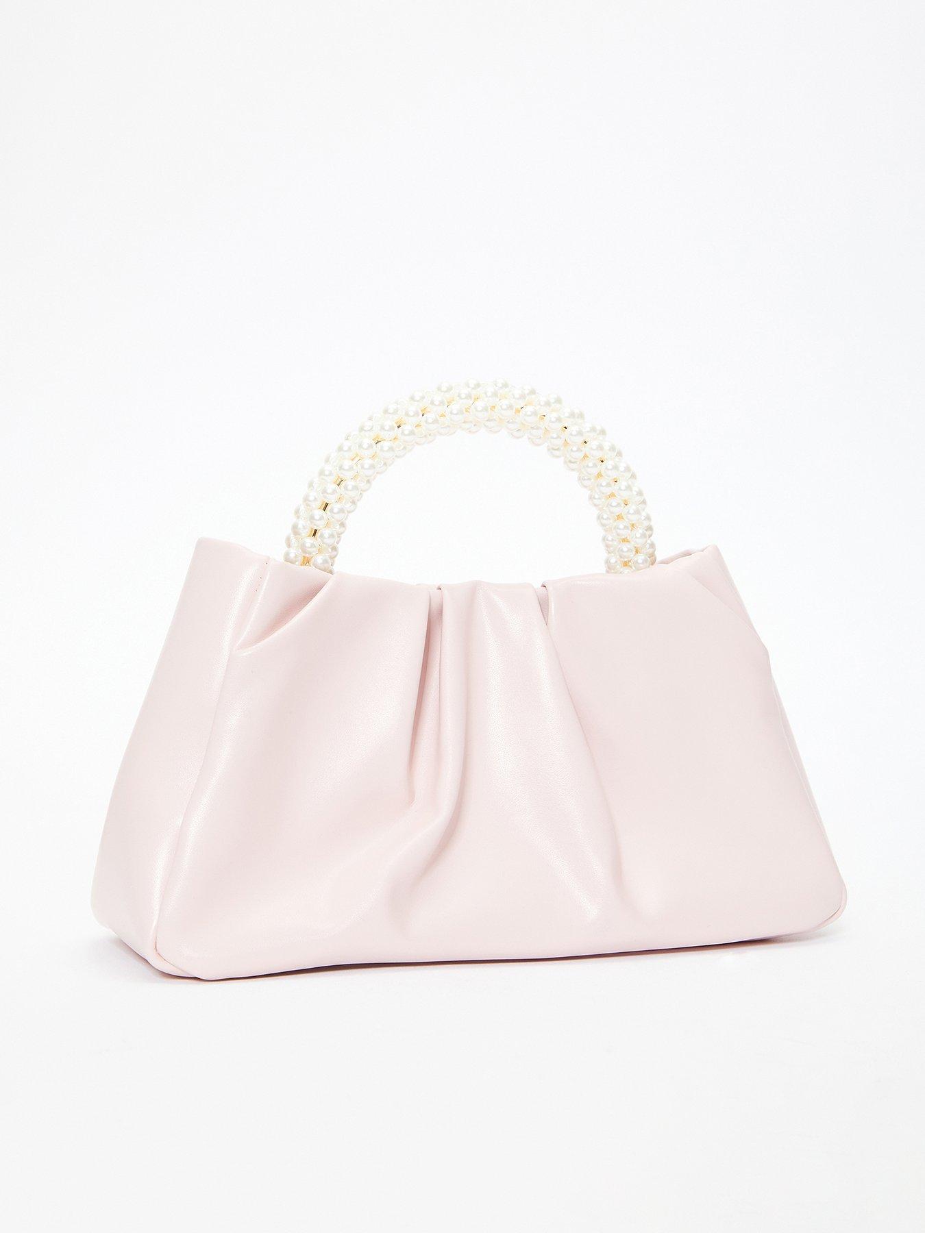  image of quiz-pearl-handle-bag
