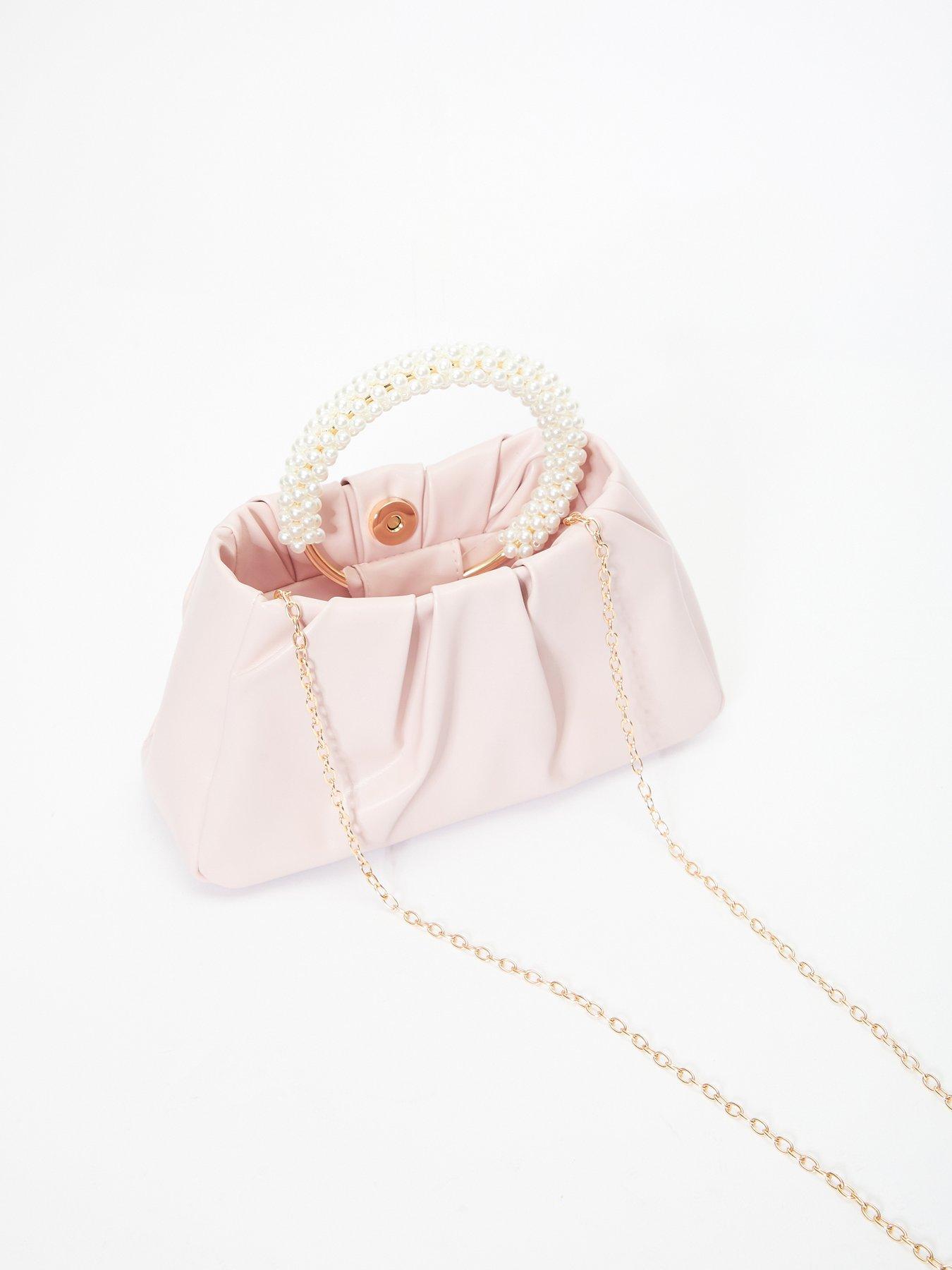  image of quiz-pearl-handle-bag