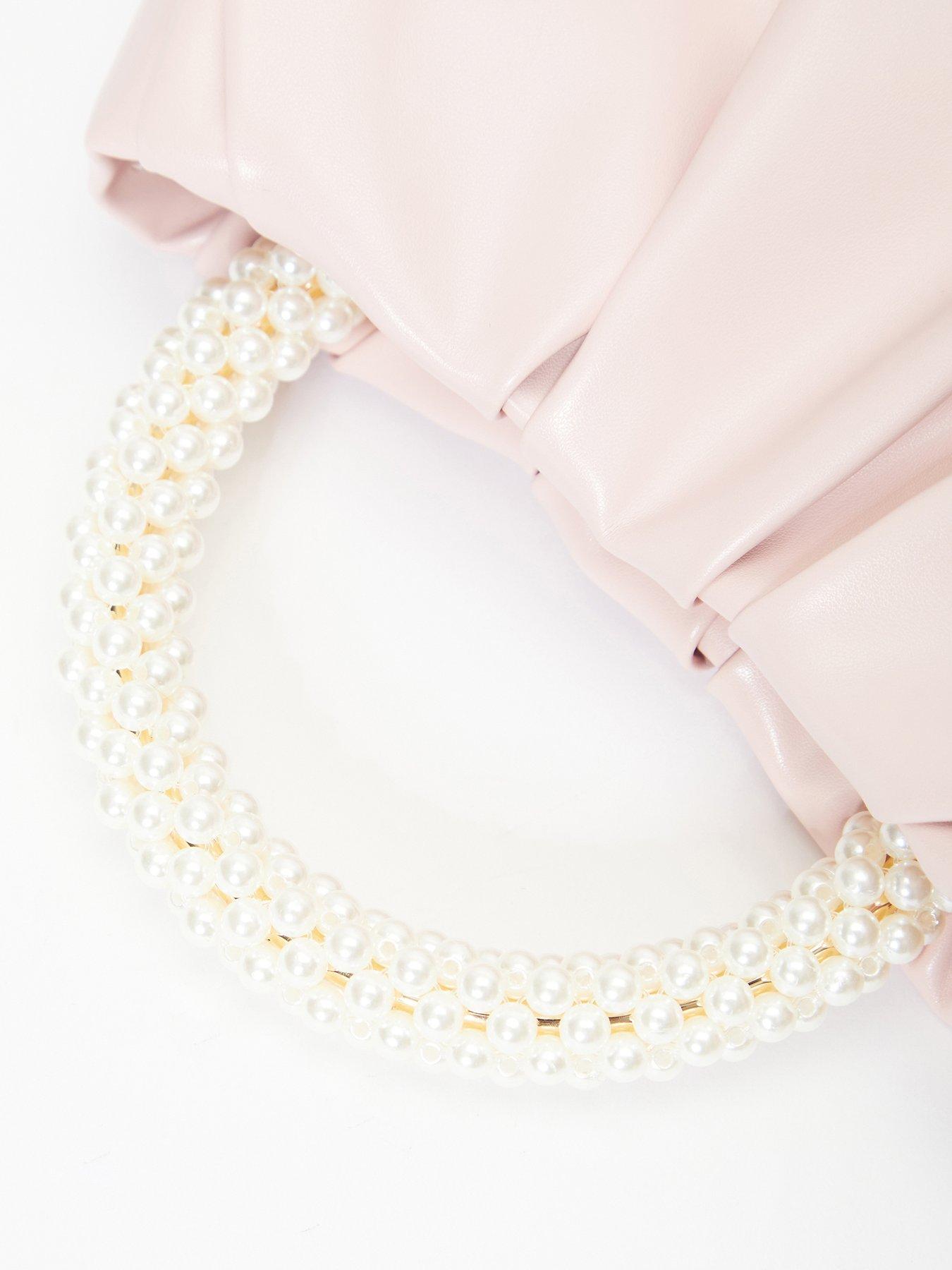  image of quiz-pearl-handle-bag