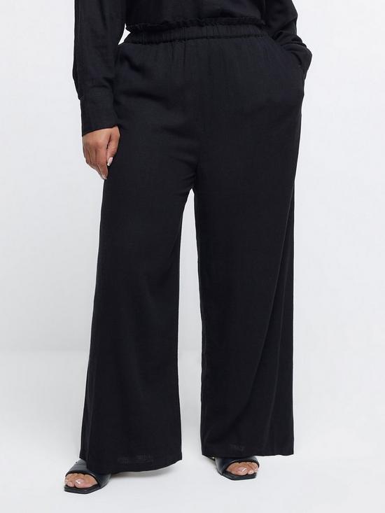 front image of ri-plus-plus-linen-trousers-black