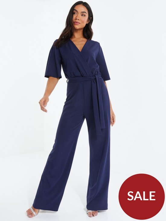 front image of quiz-scuba-wrap-palazzo-jumpsuit-with-angel-sleeves-blue