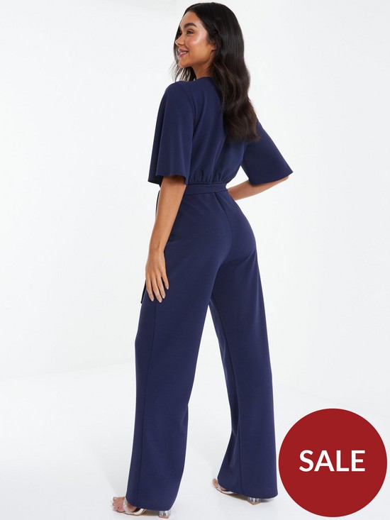 stillFront image of quiz-scuba-wrap-palazzo-jumpsuit-with-angel-sleeves-blue