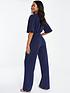  image of quiz-scuba-wrap-palazzo-jumpsuit-with-angel-sleeves-blue