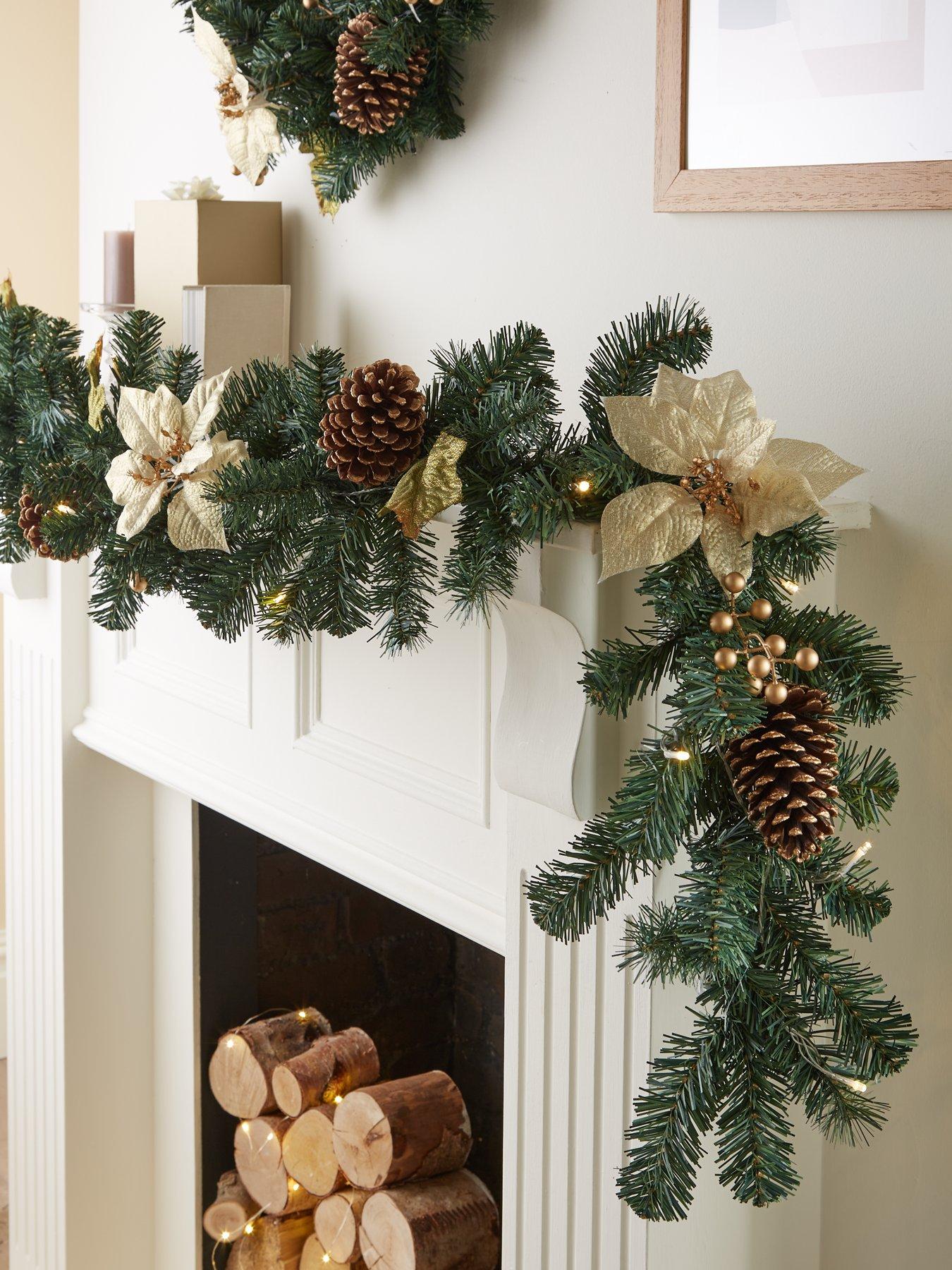 Image 1 of 6 of The Very Collection 6ft Poinsettia Pre Lit Christmas Garland - Gold