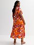  image of new-look-curves-orange-floral-wrap-midi-dress