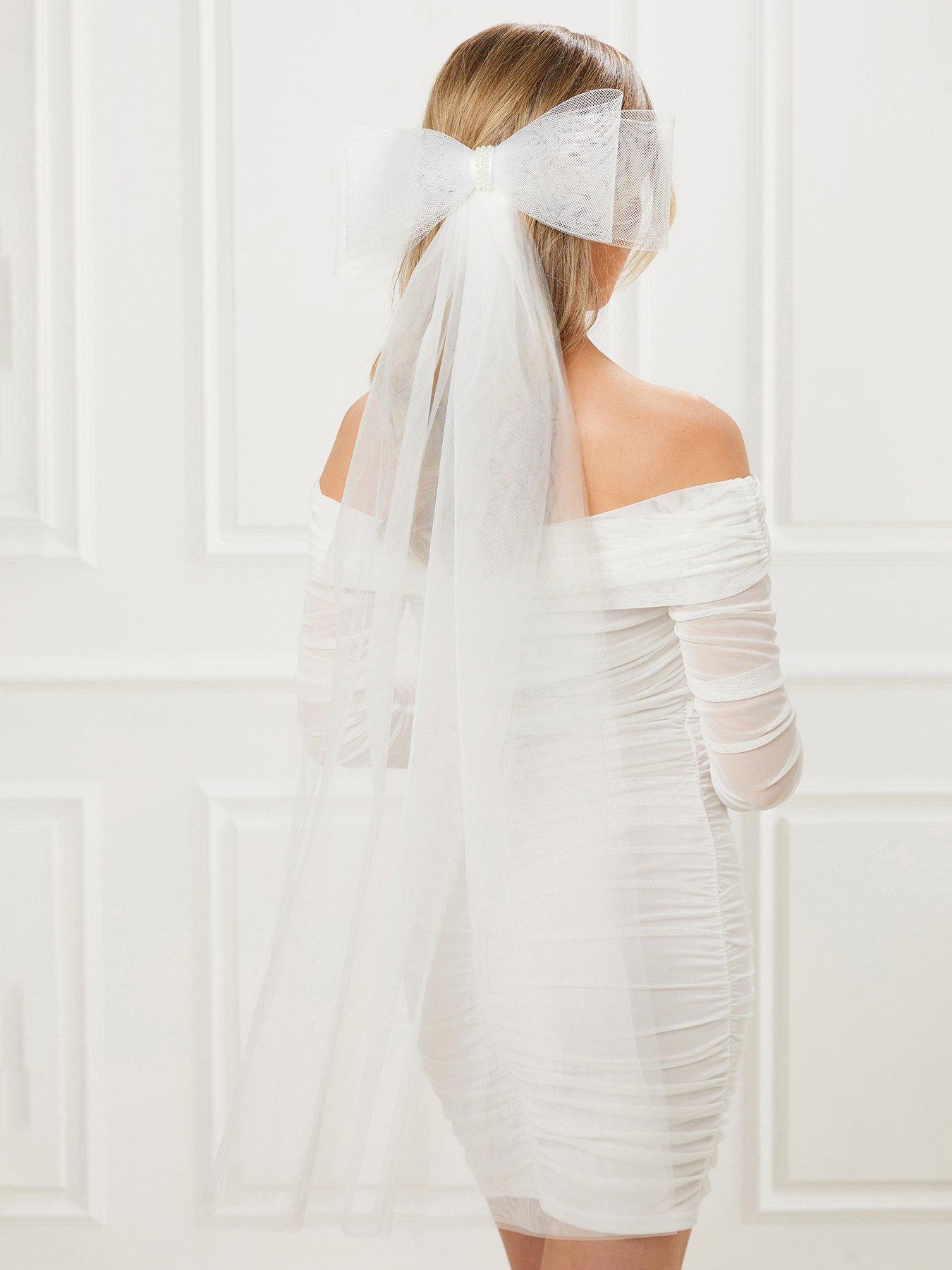  image of quiz-bridal-bow-veil