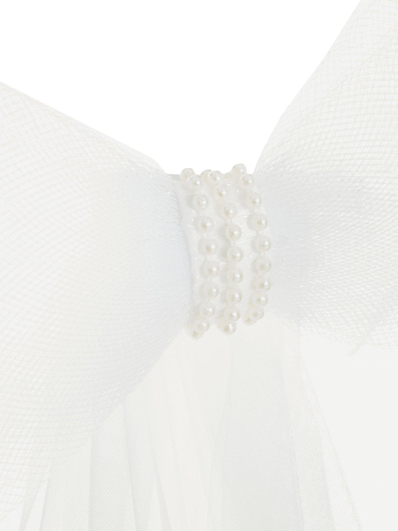  image of quiz-bridal-bow-veil