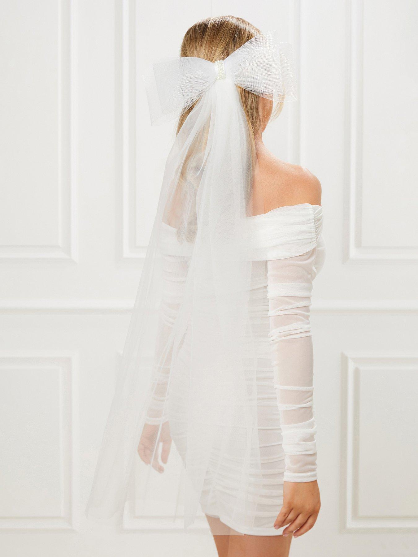  image of quiz-bridal-bow-veil