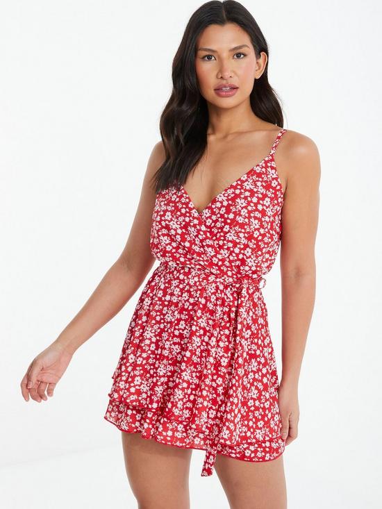 front image of quiz-ditsy-floral-wrap-playsuit