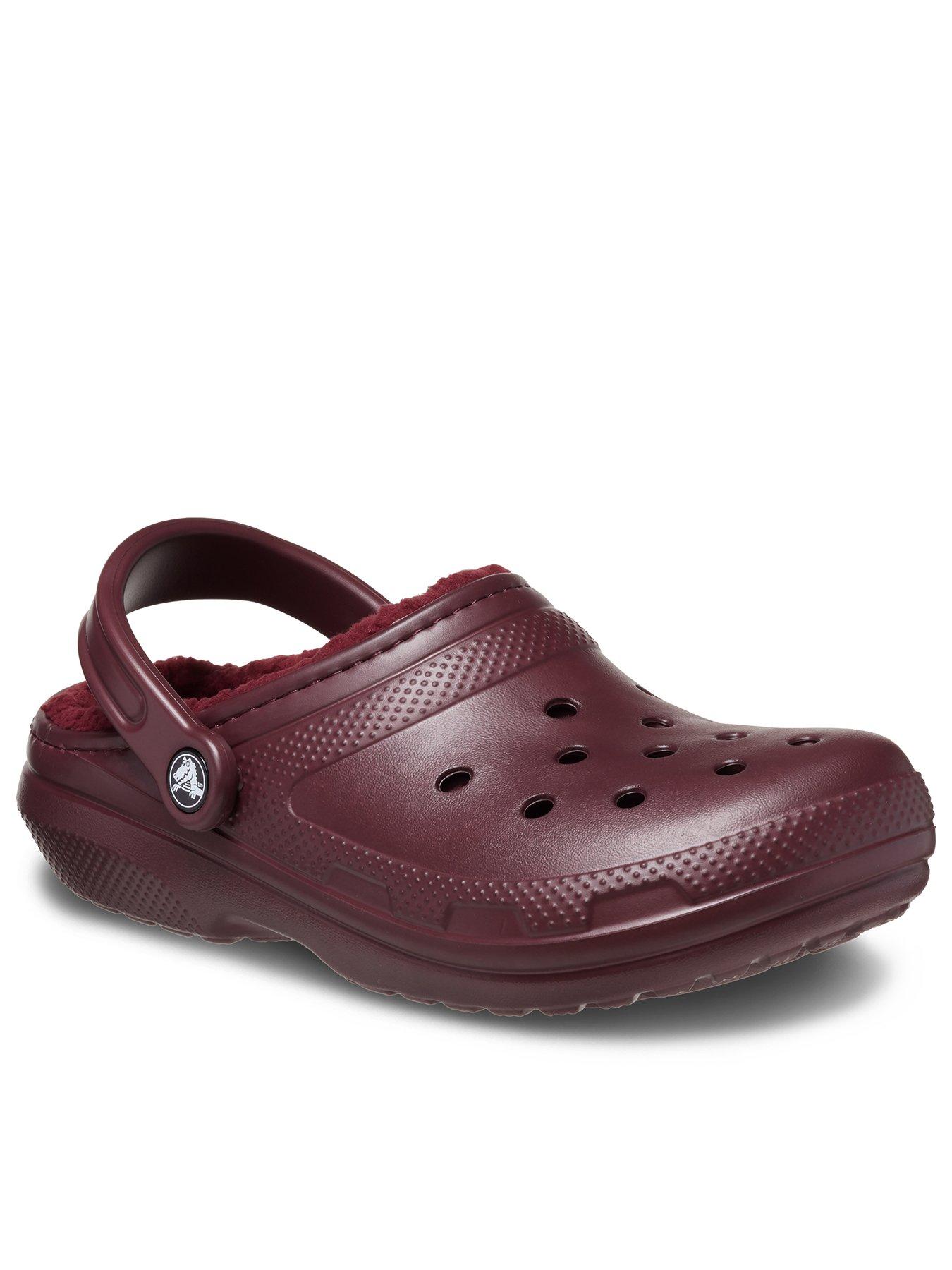 maroon crocs with fur