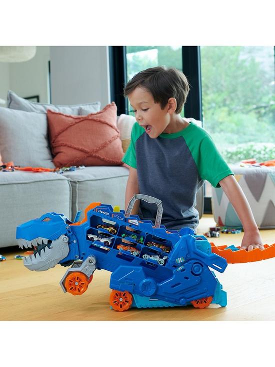 front image of hot-wheels-city-ultimate-t-rex-transporter-playset