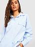  image of boohoo-poplin-contrast-stripe-relaxed-fit-shirt-light-blue