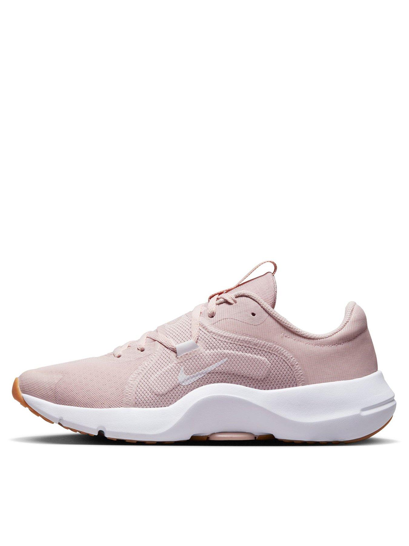 nike training free tr 8 sneakers in white with pink swoosh