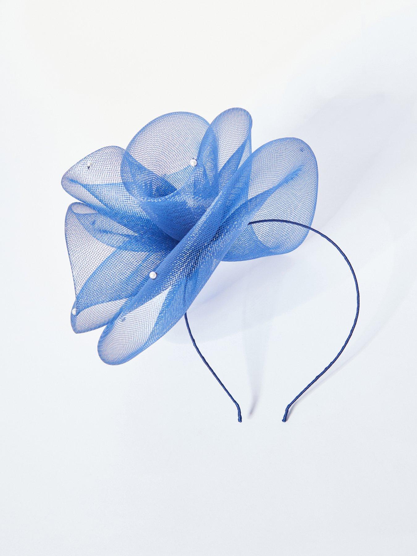  image of quiz-pearl-headband-fascinator