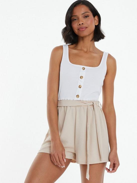 front image of quiz-cream-button-front-playsuit