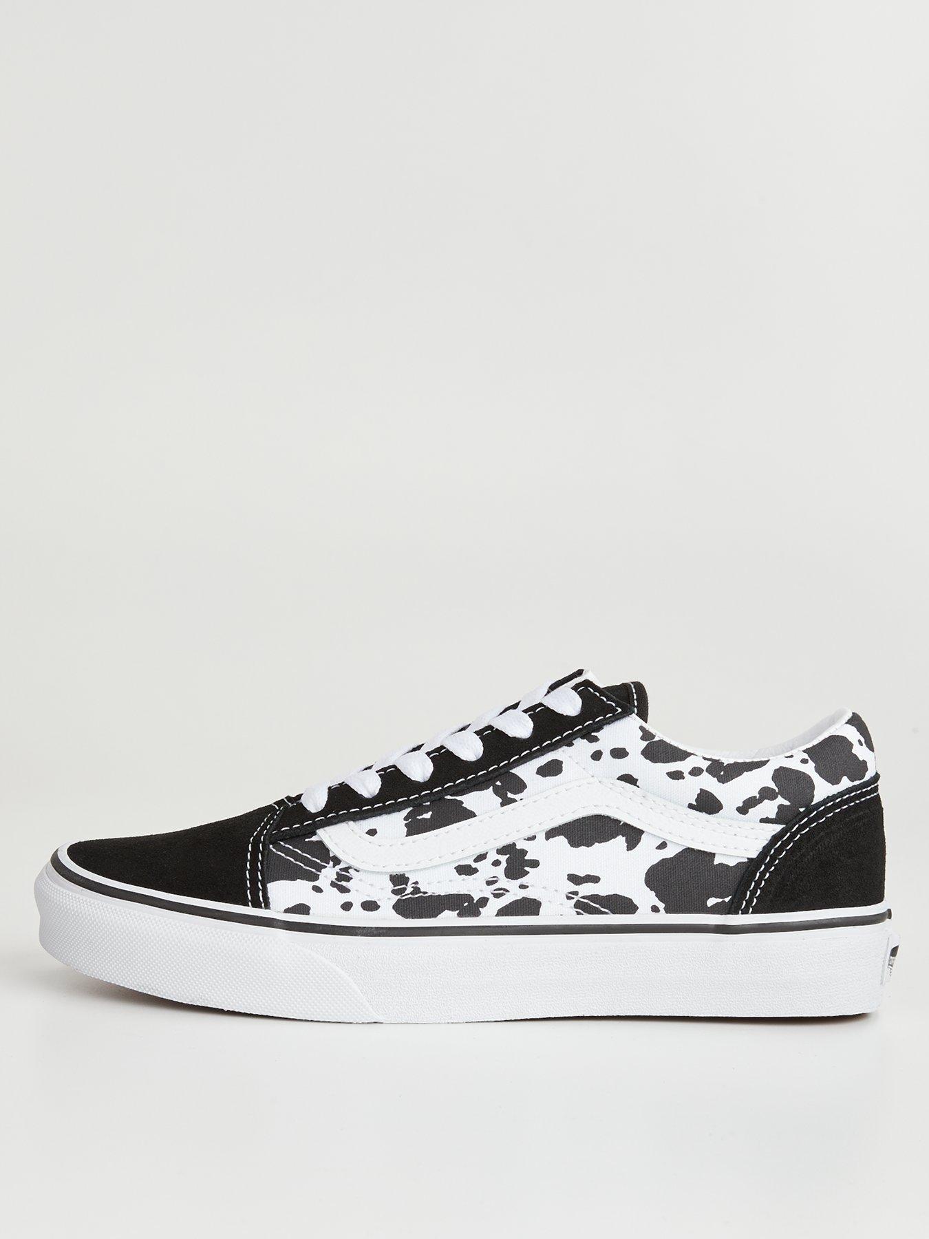 Cow print slip on hot sale vans