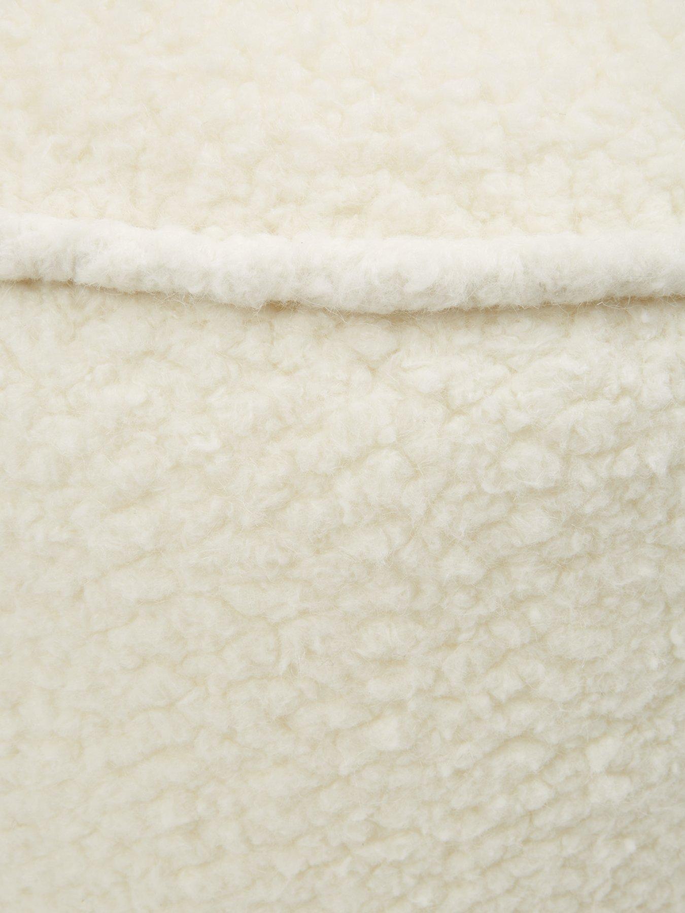  image of kaikoo-boucle-drum-pouffe