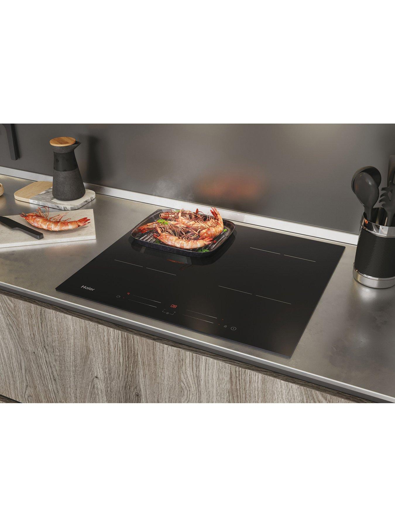  image of haier-series-4-haisj64mc-59cm-wide-induction-hob-4-cooking-zones--nbspblack