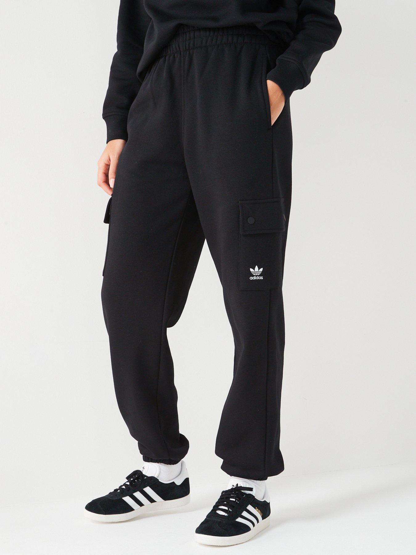 Adidas originals joggers with cut and sew best sale in black