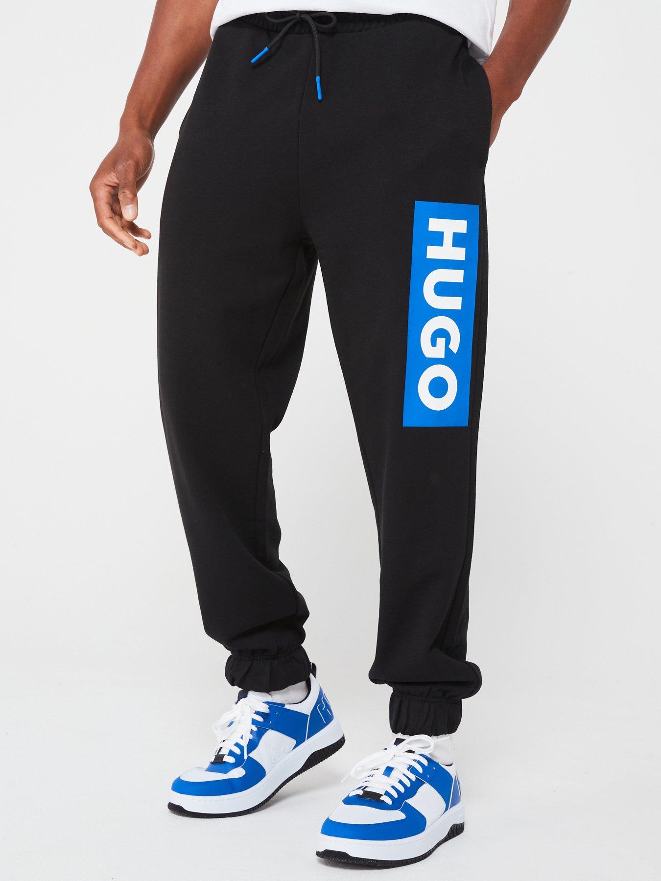 front image of hugo-nuram-regular-fit-side-logo-cuff-joggers--black