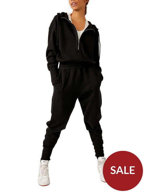 front image of free-people-womens-movement-training-day-jumpsuit-black