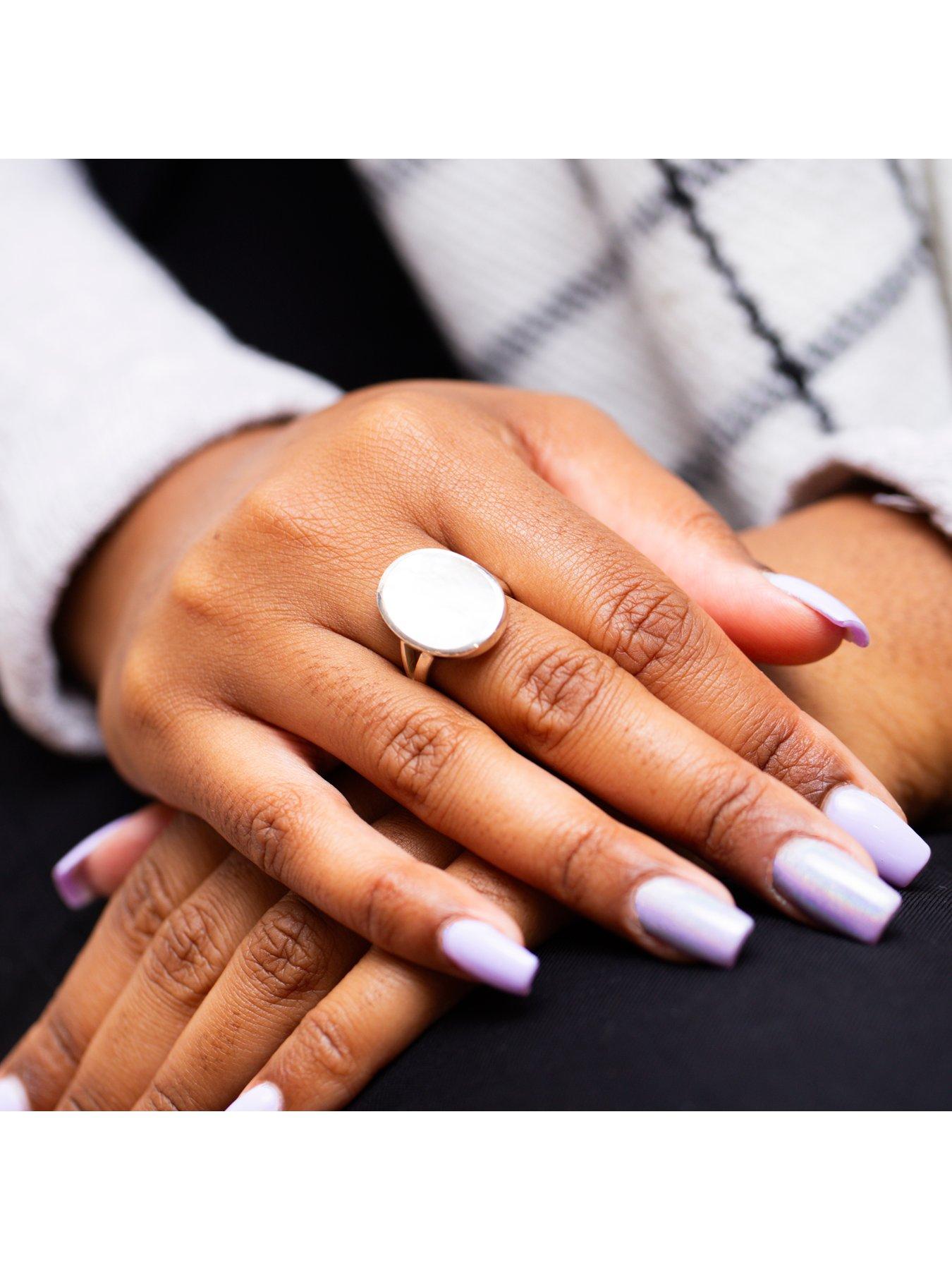  image of the-love-collection-sterling-silver-white-mother-of-pearl-15mm-x-20mm-oval-split-shoulder-ring