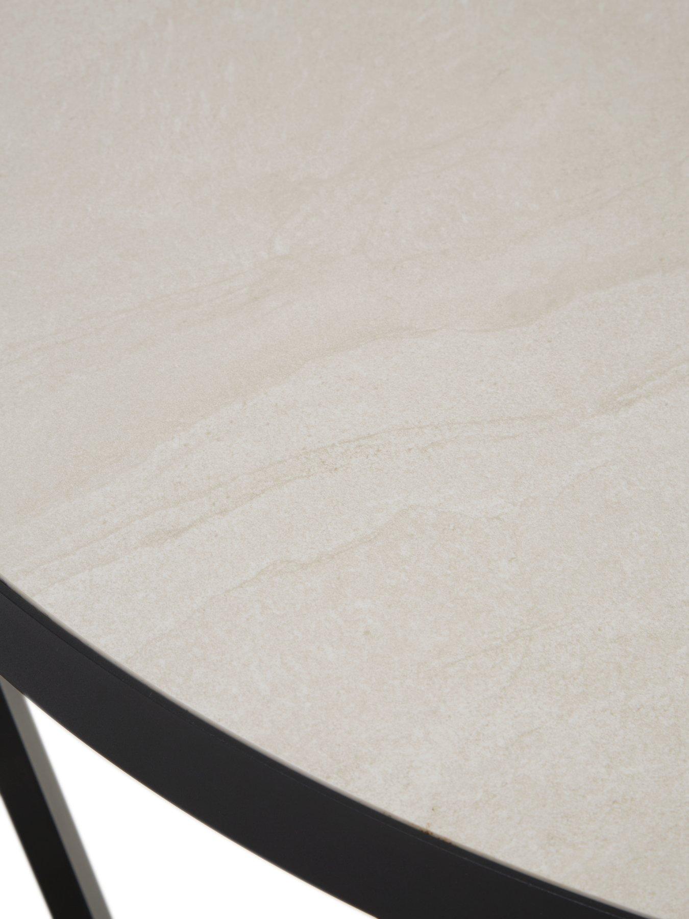  image of michelle-keegan-home-cortes-120-cm-ceramic-topnbspdining-table-4-chairs