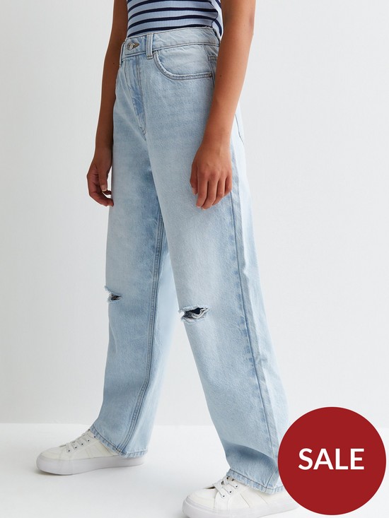 front image of new-look-915-girls-pale-blue-ripped-wide-leg-jeans
