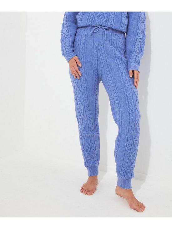 front image of joe-browns-sloe-joes-cable-knit-trousers-blue