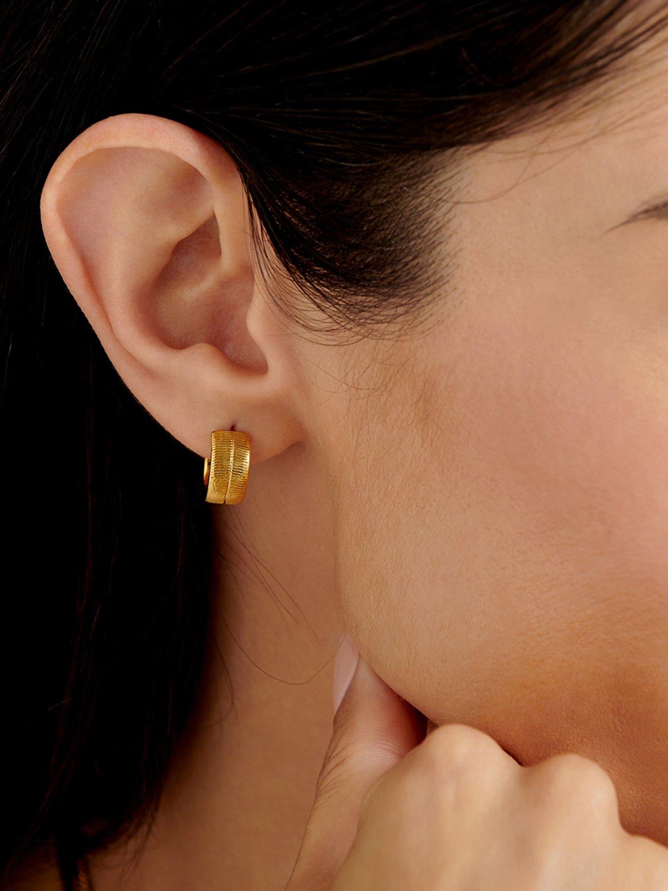  image of katie-loxton-ciana-waterproof-gold-snake-huggie-hoop-earrings