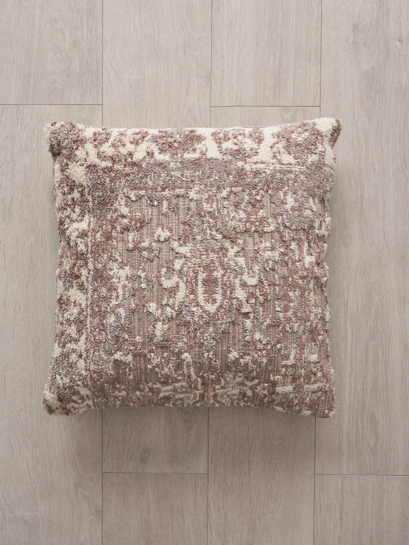 front image of the-very-collection-tapis-cushion