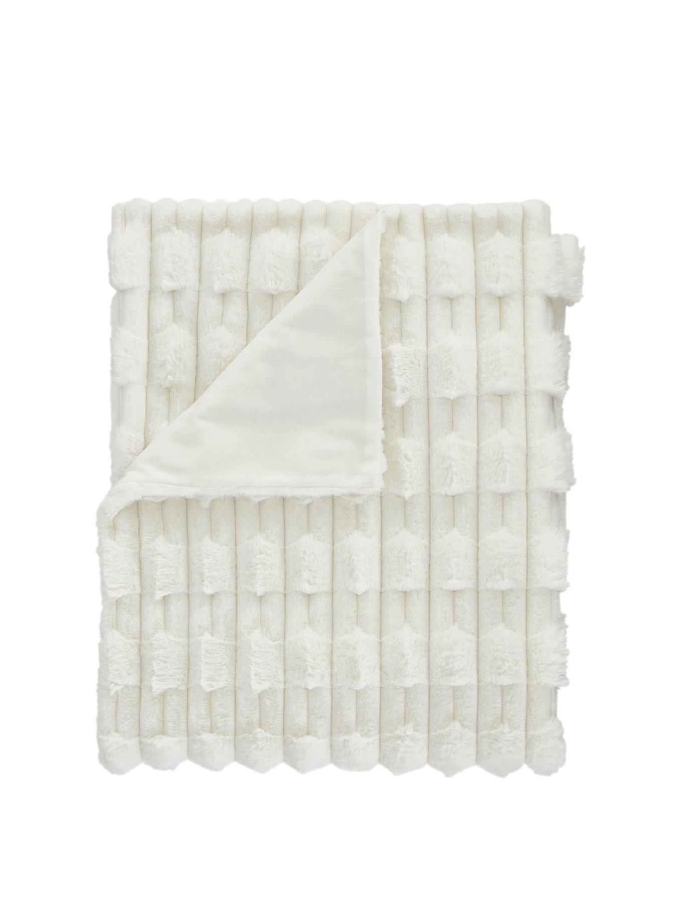  image of bianca-carved-faux-fur-cosy-throw-in-white