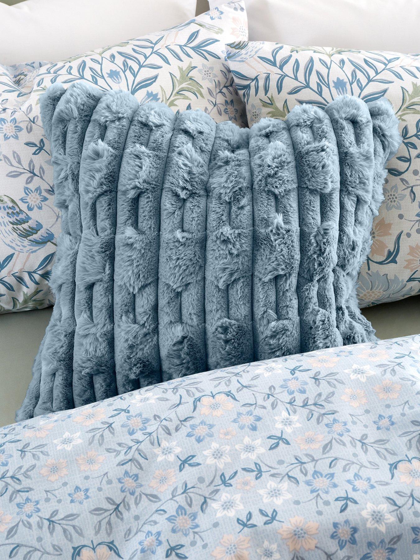 Bianca Carved Faux Fur Cosy Cushion in Blue