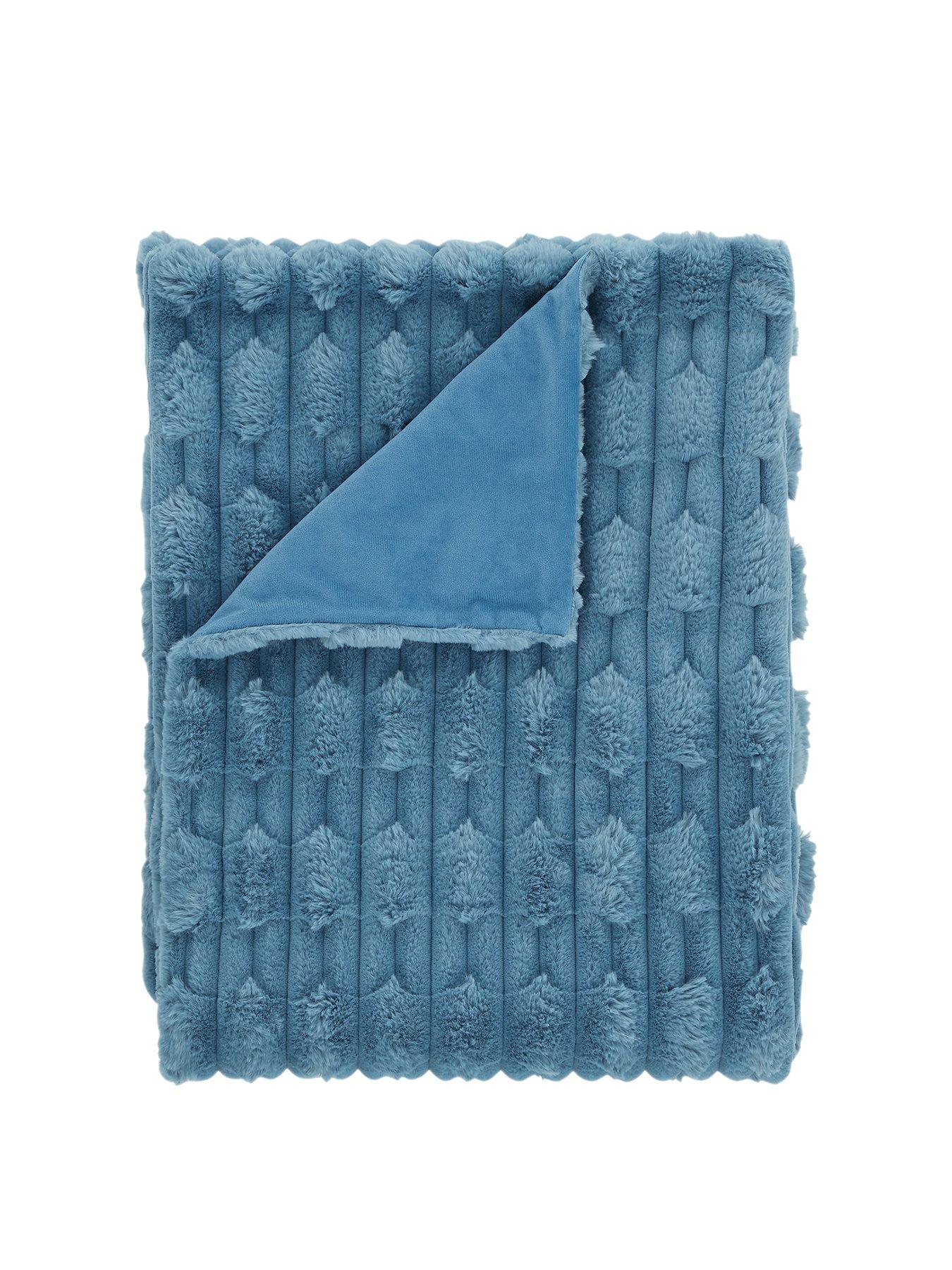  image of bianca-carved-faux-fur-cosy-throw-blue