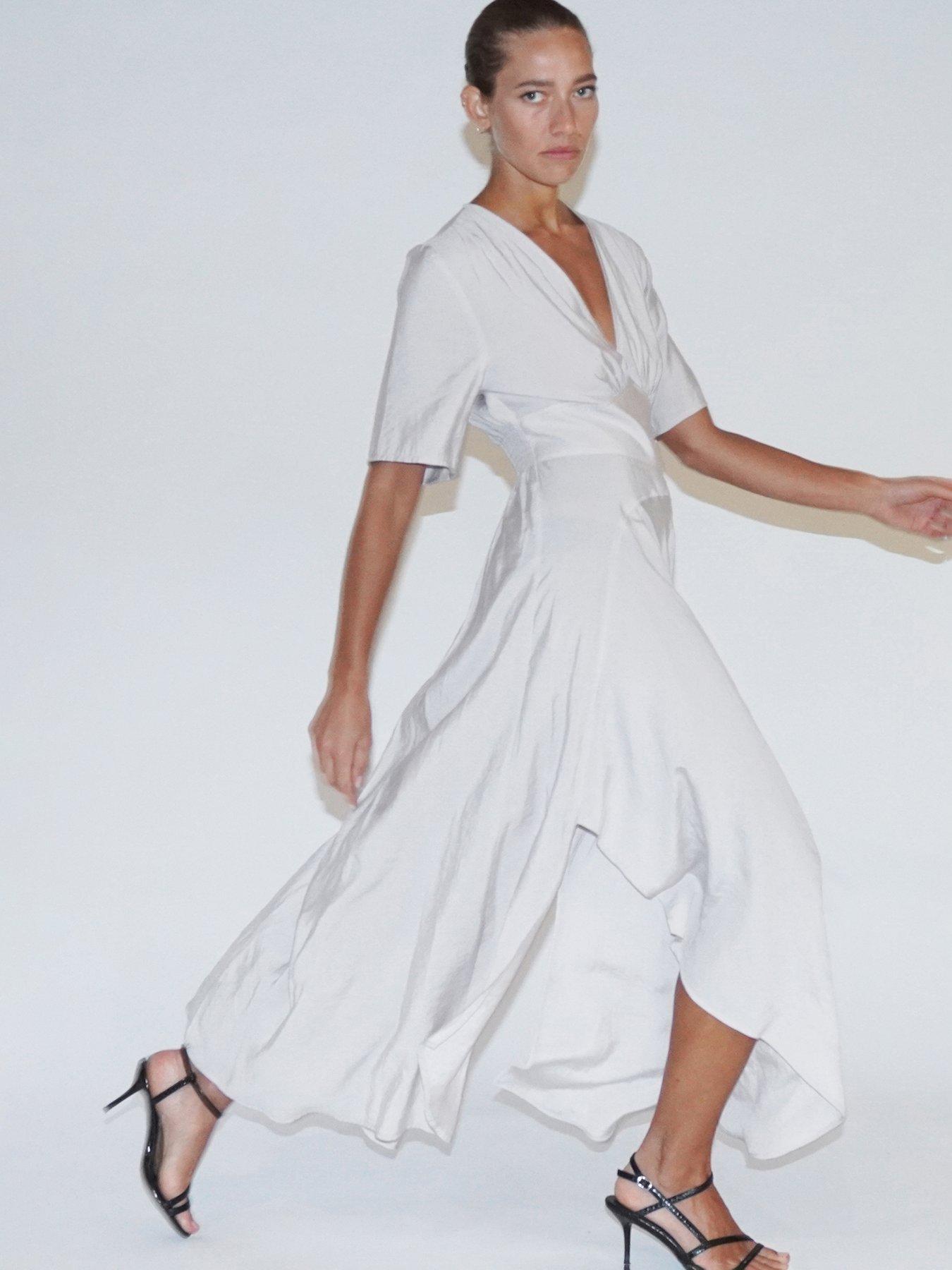  image of religion-handkerchief-hem-maxi-dress-white