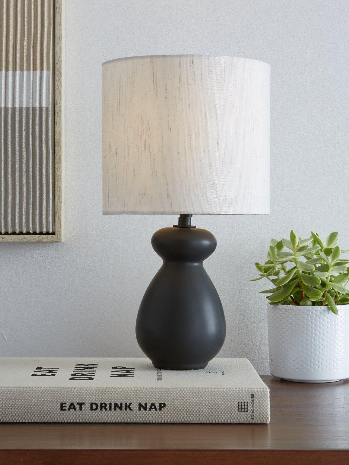 front image of the-very-collection-black-chubby-table-lamp