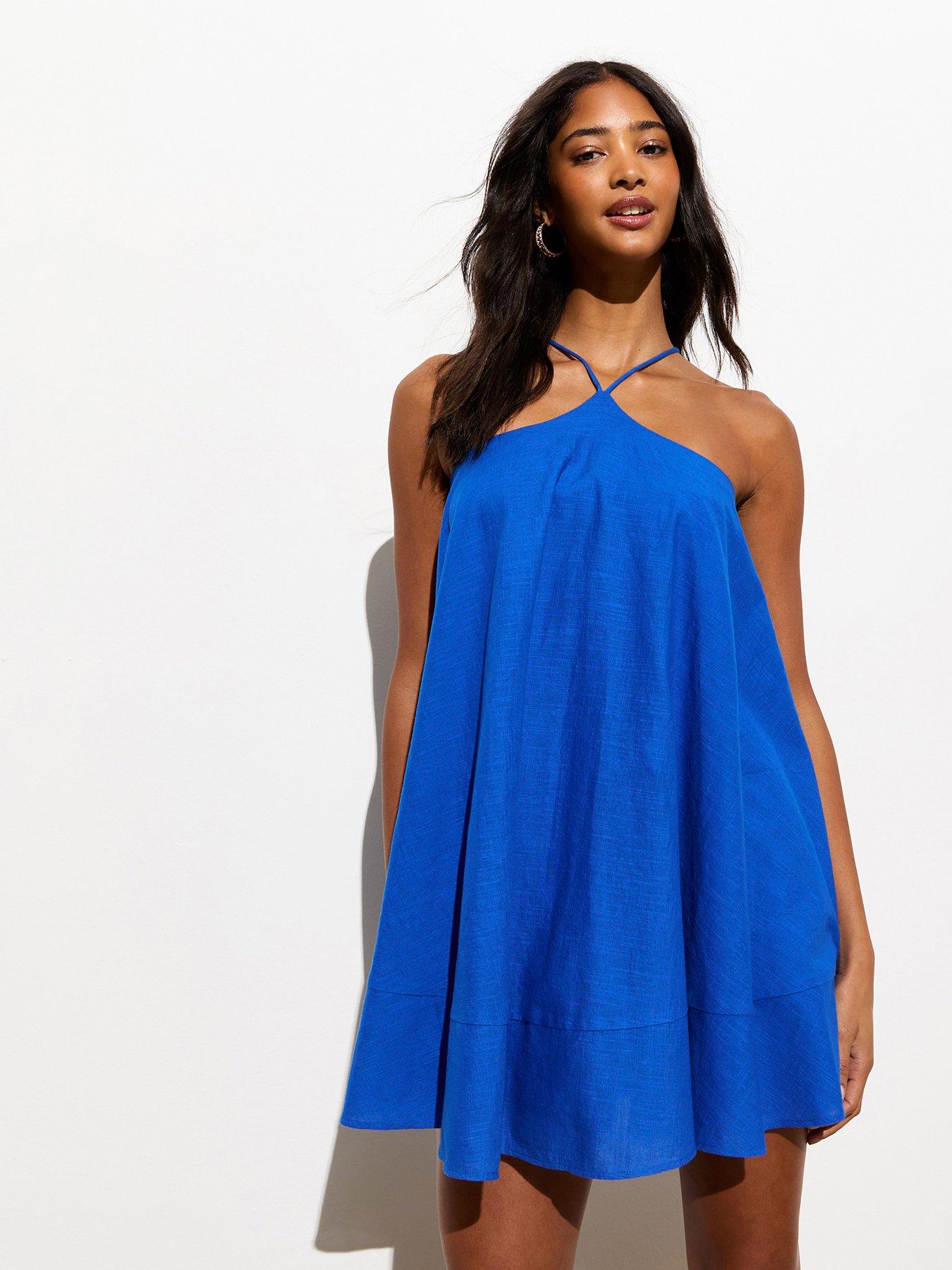 Image 1 of 4 of New Look Blue Halter Strappy Mini Dress