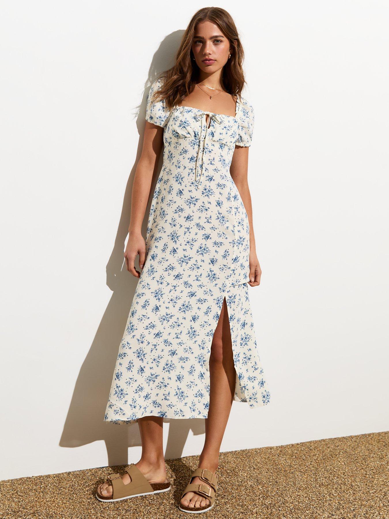 Image 1 of 4 of New Look White Floral Milkmaid Short Sleeve Midi Dress