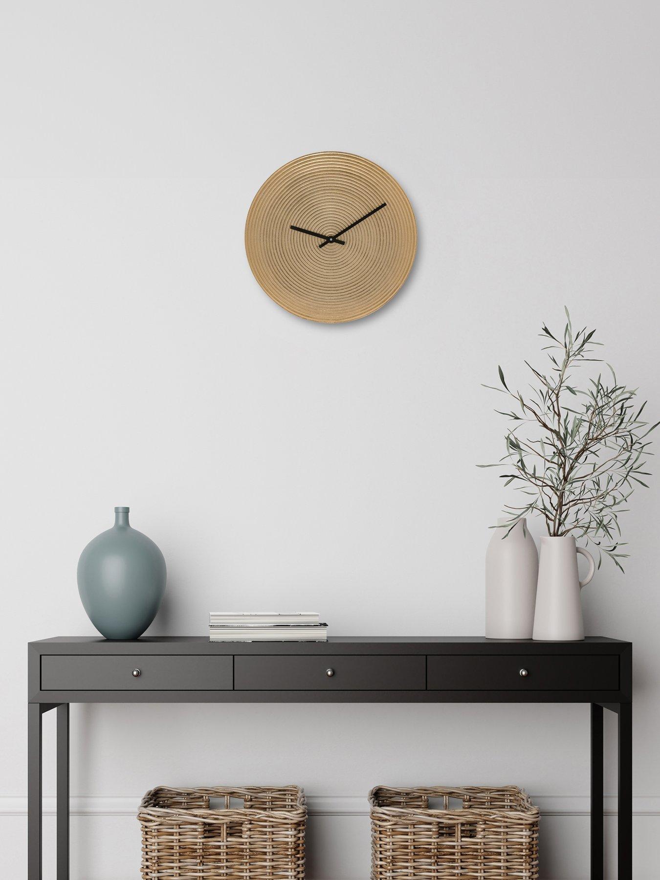 interval-gold-metal-wall-clock