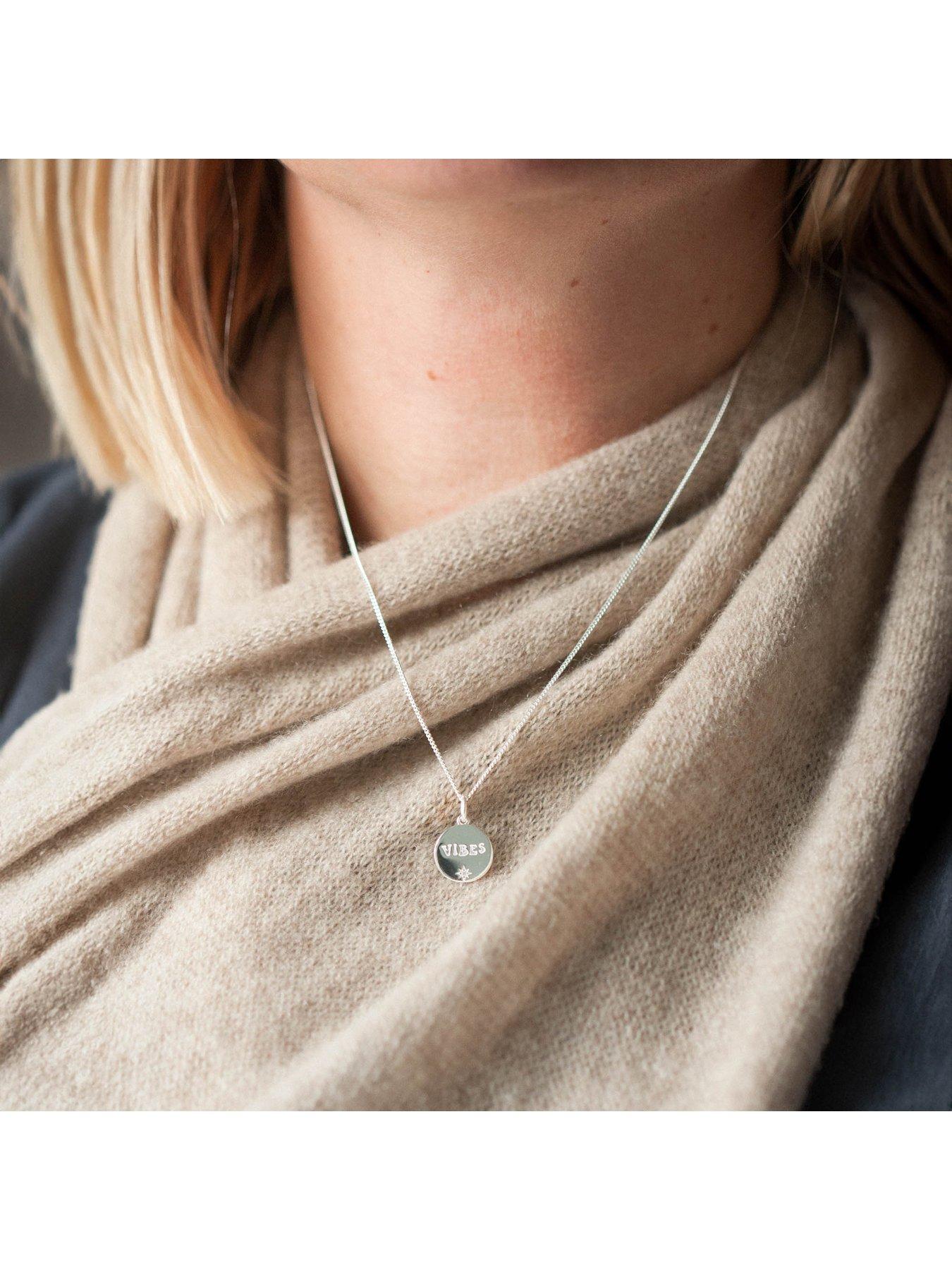 image of the-love-collection-sterling-silver-vibes-engraved-disk-with-cz-stone