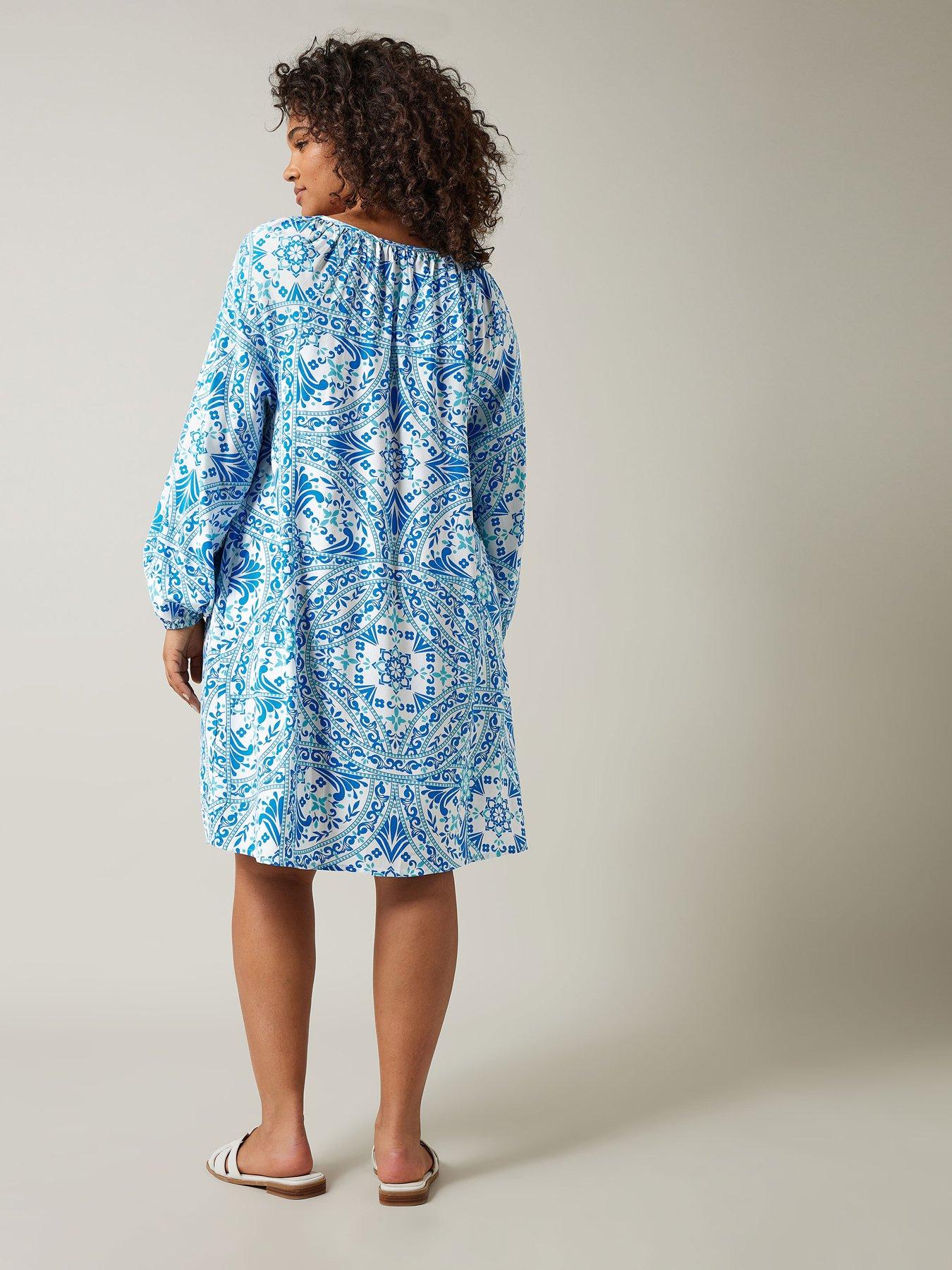  image of evans-tile-print-tunic-dress