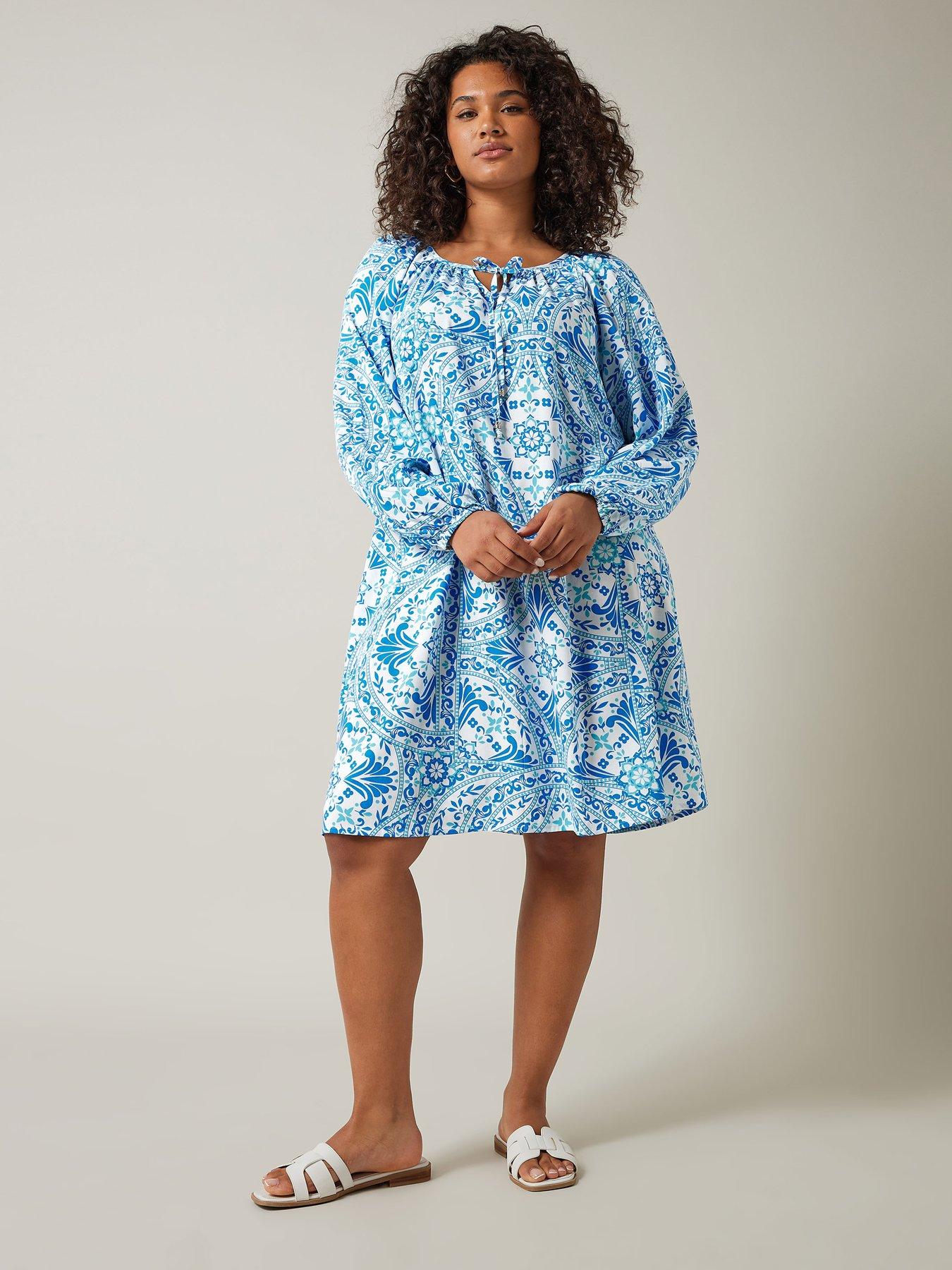  image of evans-tile-print-tunic-dress