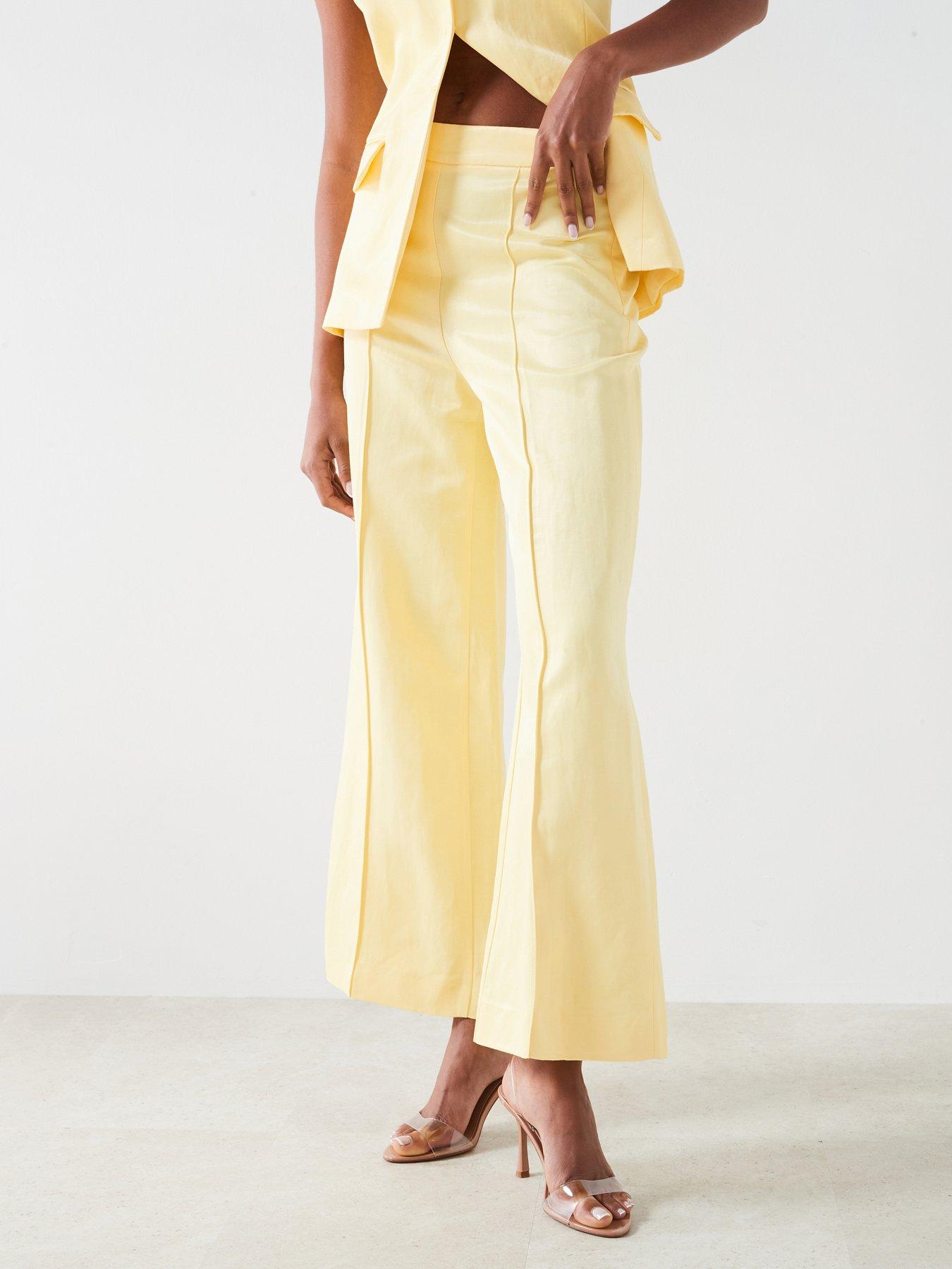 Image 1 of 5 of Mango Flared Trousers - Yellow