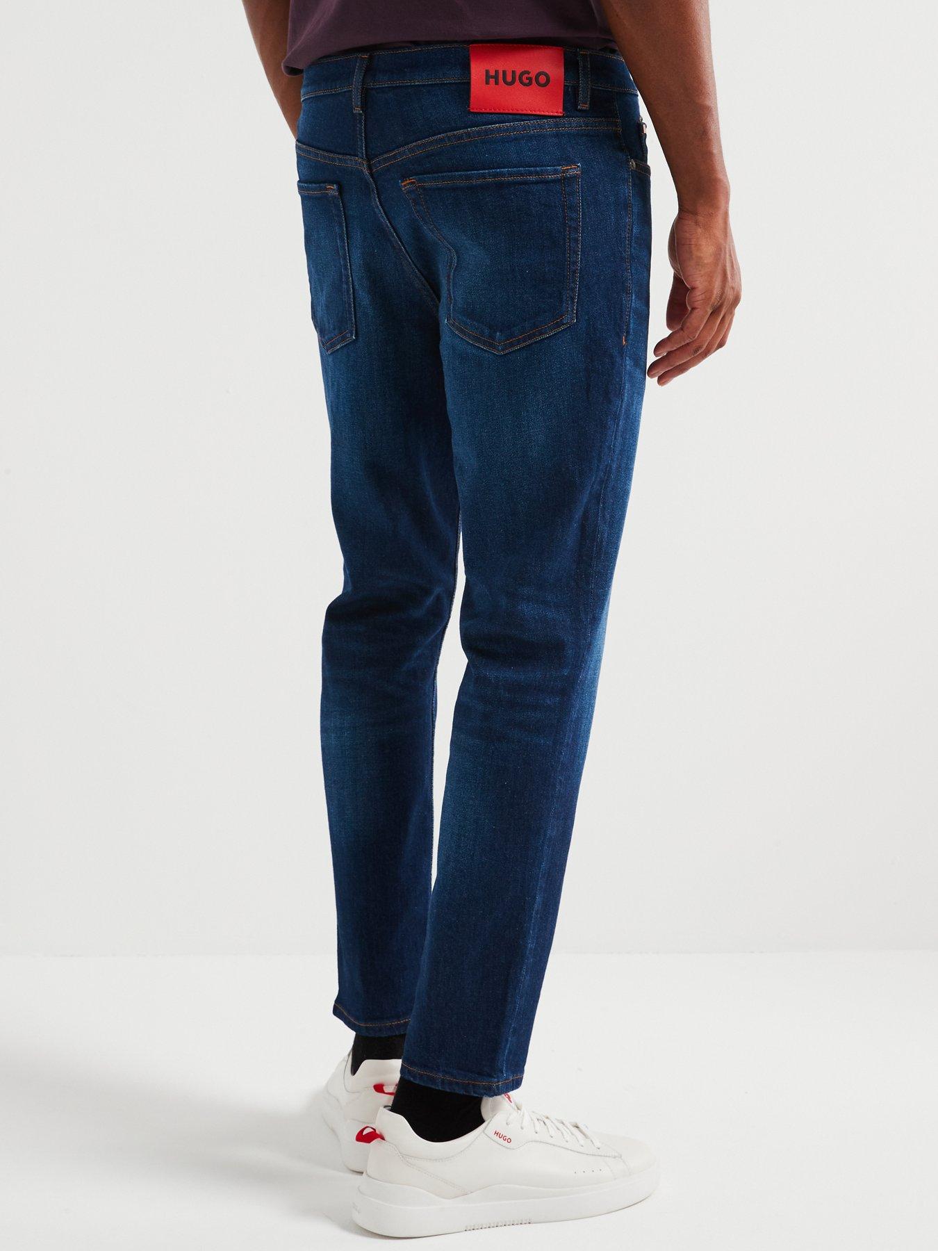  image of hugo-634-tapered-fit-jeans-dark-blue