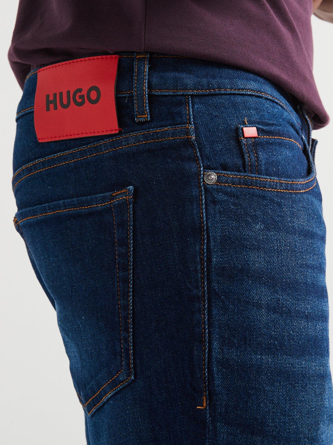  image of hugo-634-tapered-fit-jeans-dark-blue