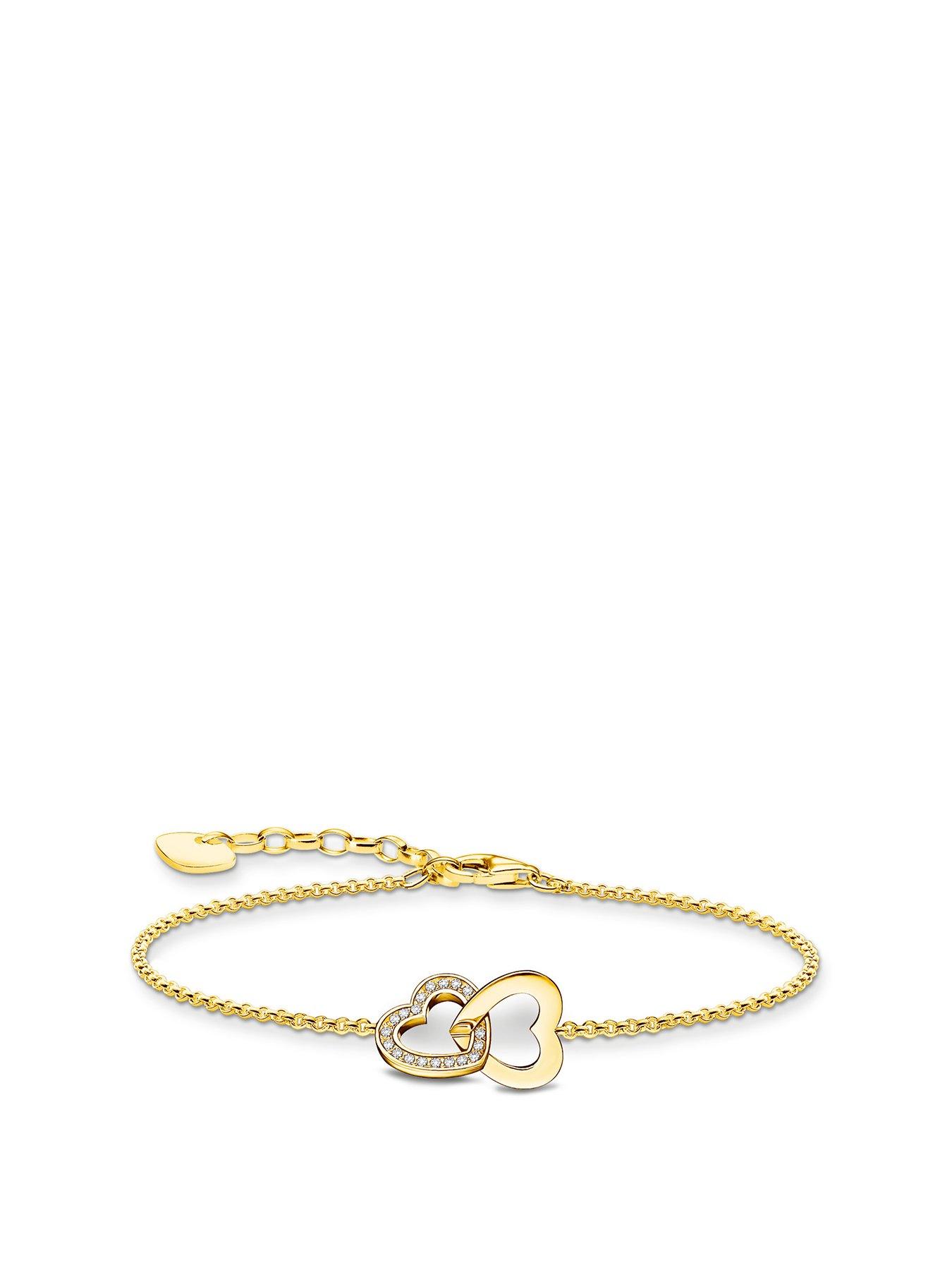undefined Intertwined hearts bracelet: romantic, playful, silver, zirconia pavé