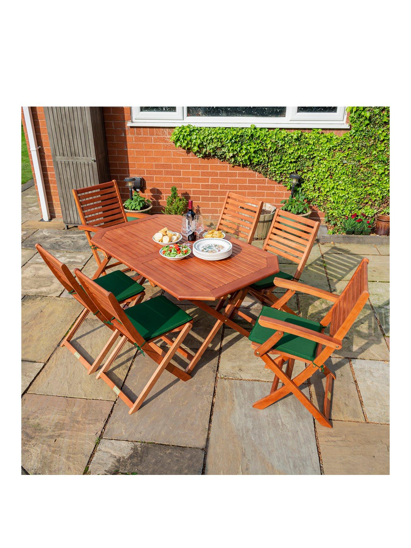  image of rowlinson-plumley-6-seater-dining-set-withnbspgreen-cushions