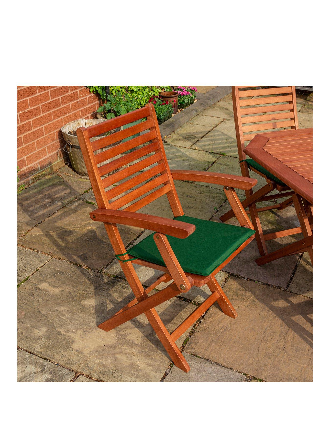  image of rowlinson-plumley-6-seater-dining-set-withnbspgreen-cushions