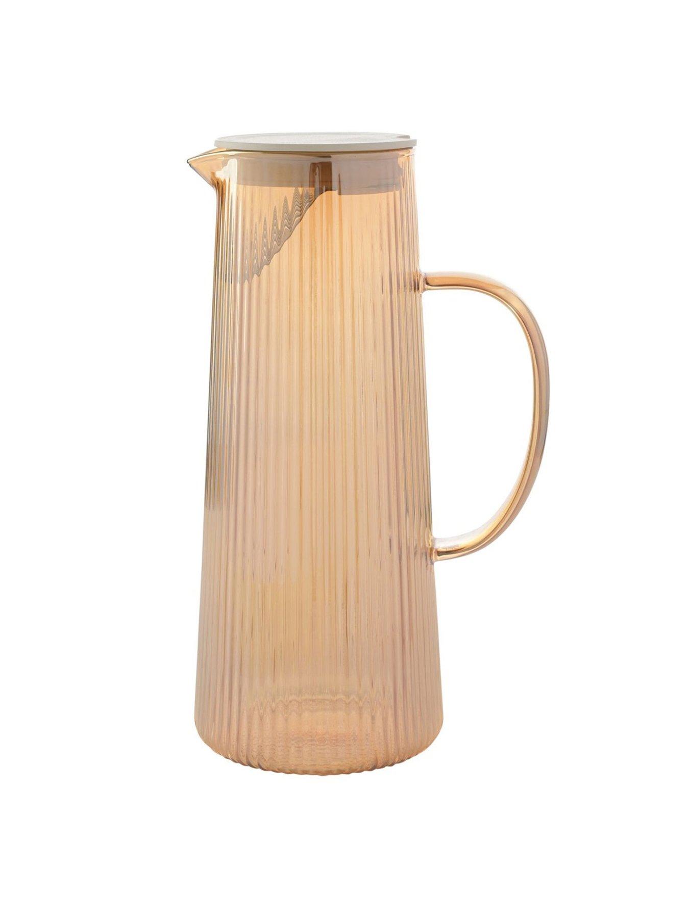  image of hestia-ribbed-glass-jug-champagne