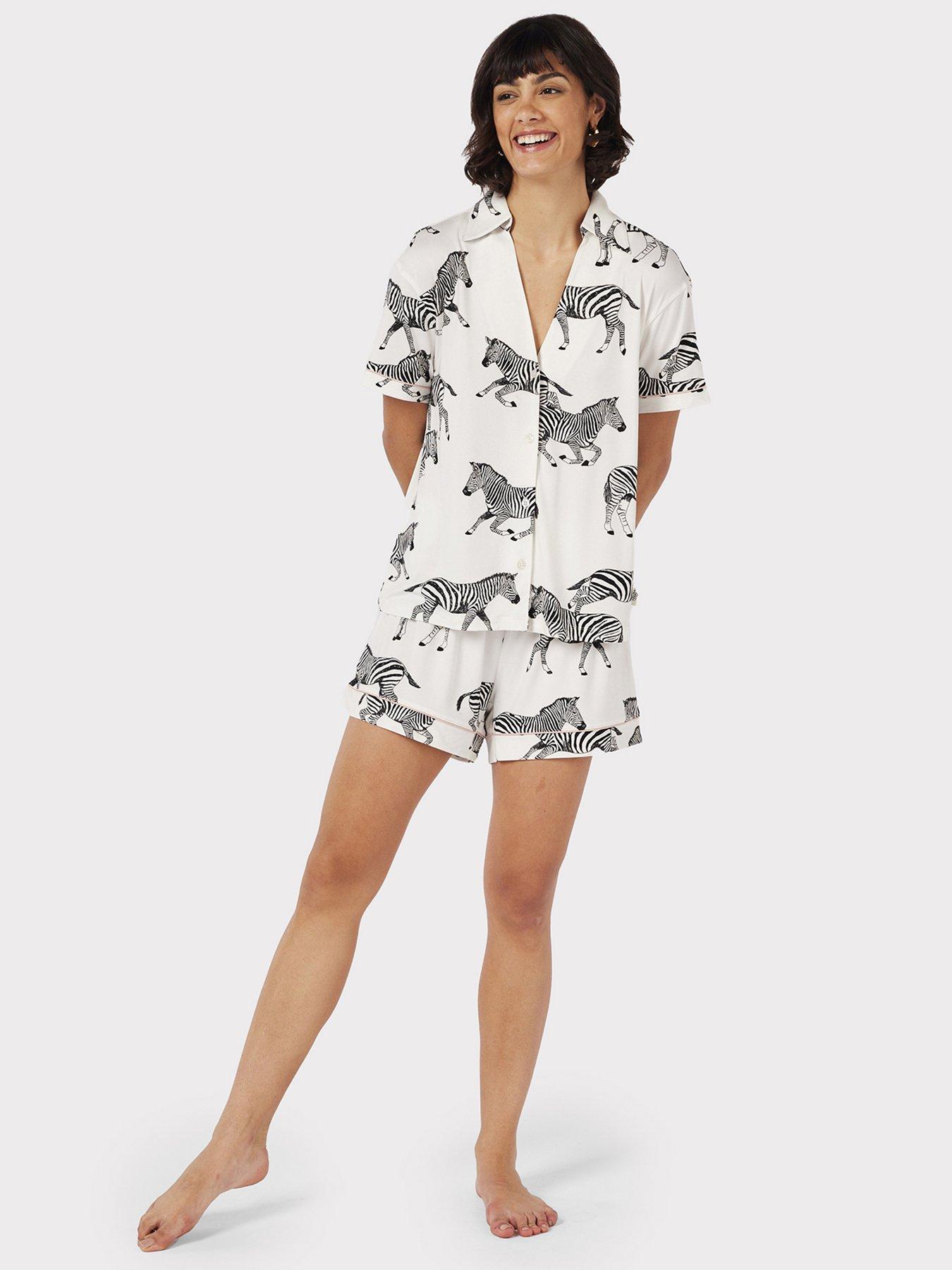 Image 1 of 6 of CHELSEA PEERS White Zebra Print V-neck Button Up Short Pyjama Set - White